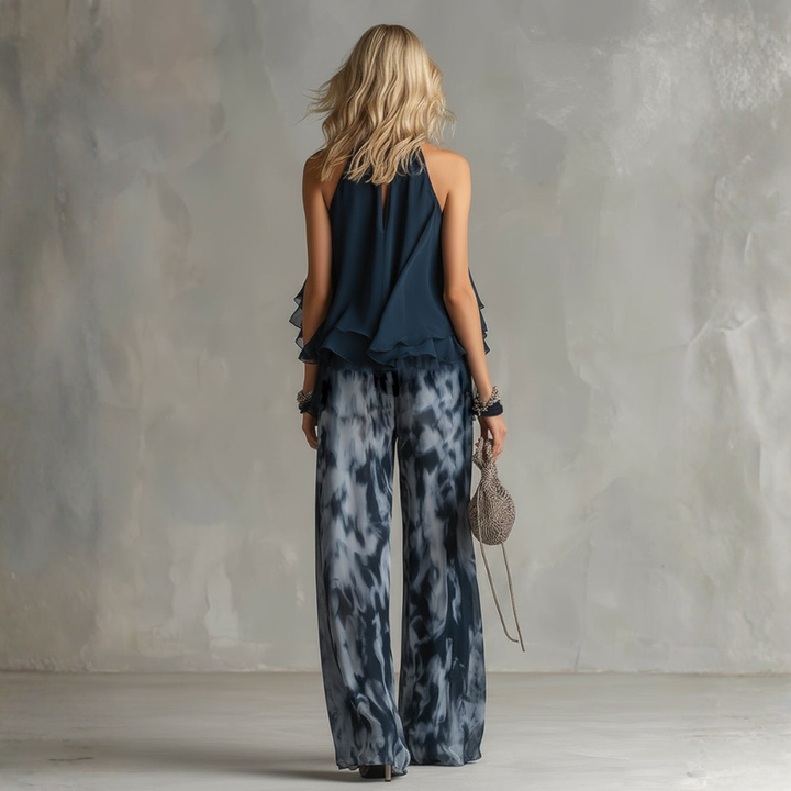 ISABELLA | ELEGANTE IN CHIFFON CON TOP ALTO E PANTALONI STAMPATI LARGHI